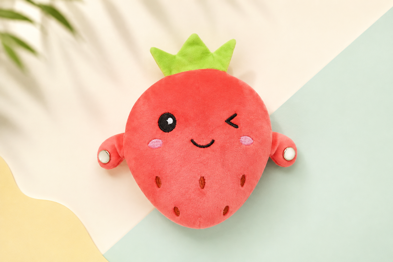 Strawberry Musical Touch Plush Pal shown clearly on a Toyella cream and mint background